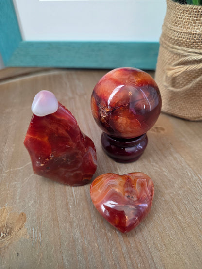 Carnelian Crystal Gift Set | Carnelian Sphere, Flame, Heart & Wooden Display Stand | 4-Piece Decorative Crystal Collection